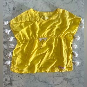 Rufflebutts yellow cover up with pom-poms. Size 2-3T.
